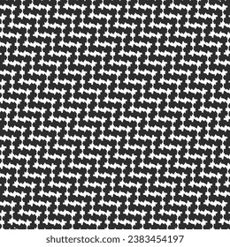 Black and white chevron pattern consisting of zigzags built from a sequence of small patches. Textile design for autumn or winter clothing. Abstract vector.