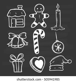 black and white christmas icons using doodle art on chalkboard background