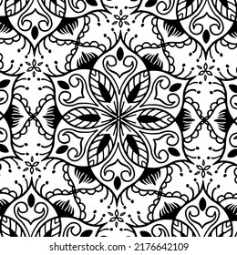 Black and white circle flower pattern in vintage mandala style for tattoos, fabrics or decorations and more. Vector illustration.