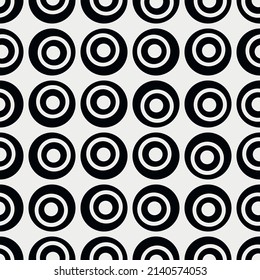 Black and white circles, one inside the other. A vector of identical spots that consist of white and black rings.