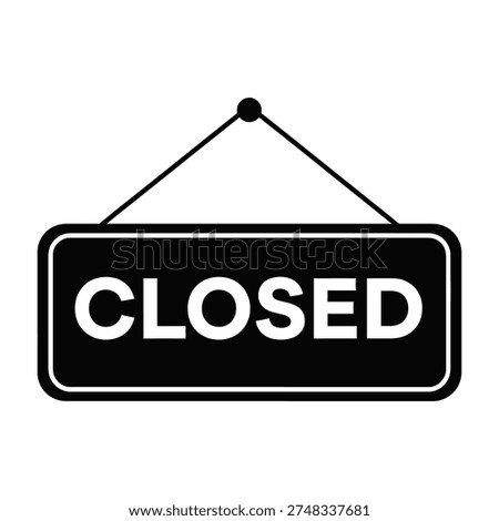 Black and white closed sign hanging on a string against a white background indicating closure or unavailability with simple design and clear message