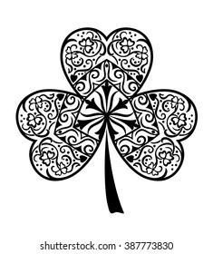 Black and white clover with three leaves, decorated with Celtic pattern. The symbol of St. Patrick's Day. Sign of good luck. Vector design