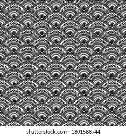 Black and white concentric circle seamless pattern. Japanese wave style with overlapping decorative rounds with chevron detail. EPS10 vector format.