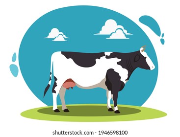 black and white cow on a green lawn with s sky background