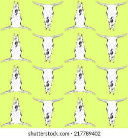 Black and white cow skull seamless pattern over lemon background.