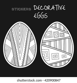 Black, white decorative eggs. Set of stickers on black background. 