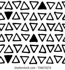 Black and white doodle seamless vector pattern. Triangle scribbled print. Abstract doodle seamless pattern. Handdrawn ornament. Memphis background decor tile. Trendy hipster ink doodle pattern tile