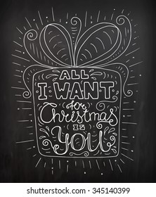 Black and white doodle typography poster with gift box. Cartoon cute card on celebration theme with lettering text - All I want for christmas is you. Hand drawn vector isolated on chalkboard.