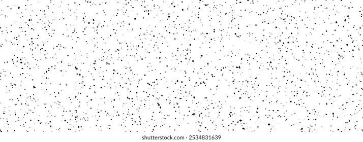 Black and white dotted seamless pattern. Dirty grunge sprinkles, particles, dust and splashes wallpaper. Distress noise grain repeating background. Random splattered gritty overlay texture. Vector