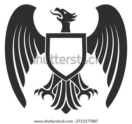 A black and white eagle with a shield on its chest
