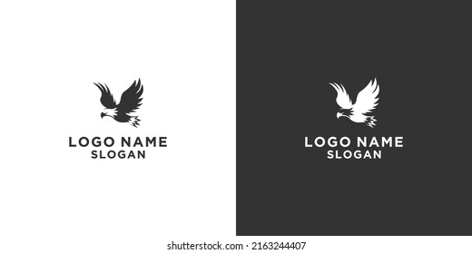 black and white eagle vector logo flying pouncing