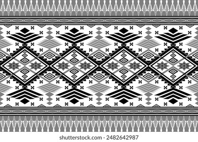 Black and white Ethnic seamless pattern. Tribal geometric Abstract Aztec Navajo seamless stripes and lines on gray background. Texture fabric print design for Batik Sarong Silk Wallpaper curtain