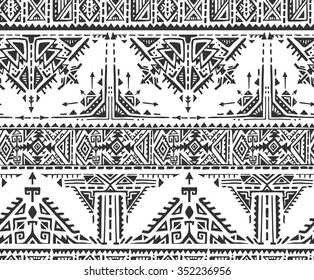 Black and white ethnic tribal seamless pattern with hand drawn elements. Aztec geometric print. Hipster background. 