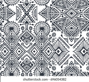 Black and white ethnic tribal seamless pattern with hand drawn elements. Vector aztec geometric print. Hipster endless background.