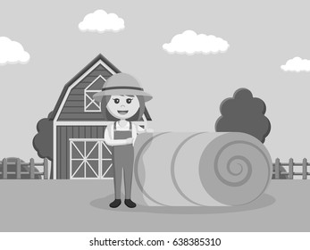 black and white farmer woman pointing to straw roll black and white style