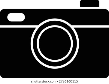 Black and white flat of a digital camera with a central lens and a rectangular shutter button on a plain background