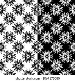 Black and white floral ornaments. Set of seamless backgrounds for textile and wallpapers