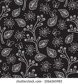 Black and white floral pattern with branches, leaves and flowers. Seamless vector background.