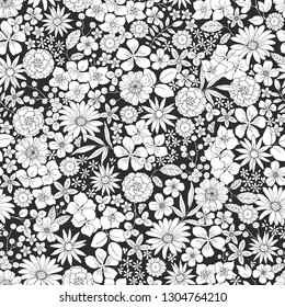 Black and white floral pattern with small flowers. Hand drawn vector illustration in vintage ditsy style.