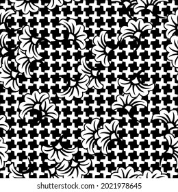 Black and white floral print with ginkgo leaves on checkered background.