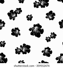 Black and white floral seamless pattern. Hand drawn silhouette of flowers. Vector background.