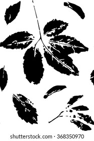 Black and white floral seamless pattern with leaves of wild grape and maple seeds stylized as stamp or imprint; rustic or boho style. May be used for textile, wrapping paper or in scrapbooking