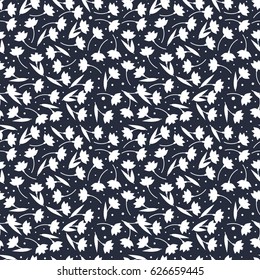 Black and white flower seamless pattern. Simple white flower silhouettes on blue background. Vector illustration.