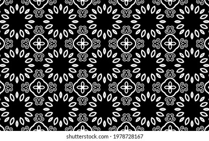 Black white geometric background. Ethnic pattern of the peoples of the East and Asia. Fashionable original doodling style with curls and flowers. Template for wallpaper, stained glass, presentations.