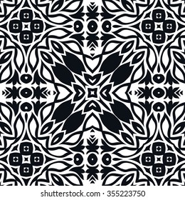 Black and white geometric floral background seamless pattern, repeating fabric texture. Tribal ethnic ornament, vector illustration.