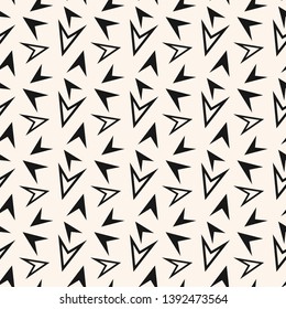 Black and white geometric seamless pattern with chaotic scattered triangles, small arrows. Simple abstract monochrome background. Minimalist repeat texture. Design for decor, fabric, print, wallpapers