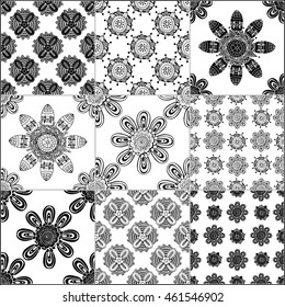 Black and white geometric tiles seamless patterns set, vector