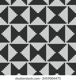 Black and white geometric triangle knitted jacquard seamless pattern for interior design. Monochrome geometric vector illustration.