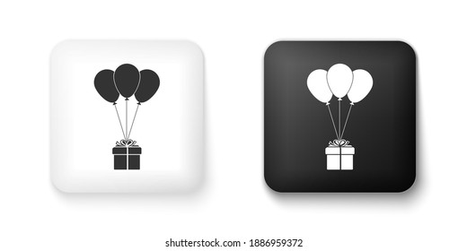 Black and white Gift box with balloons icon isolated on white background. Square button. Vector.
