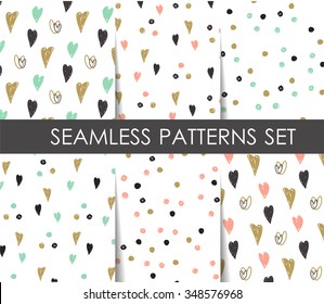 Black, white and gold hearts and dots seamless patterns set. Vector geometrical .   Design  for paper, wallpaper, textile, fabric, and other projects. 