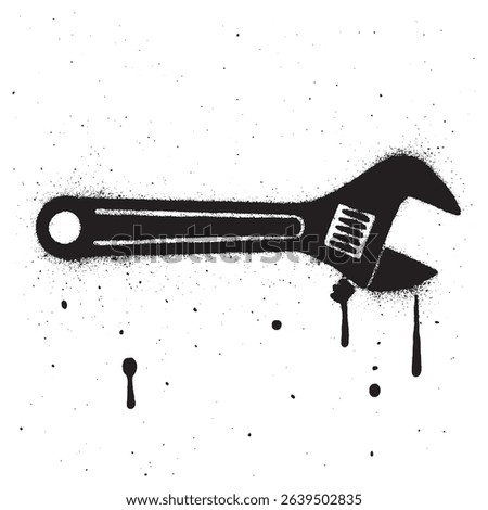 Black and White Graffiti Stencil of Adjustable Wrench with Spray Paint Texture.	