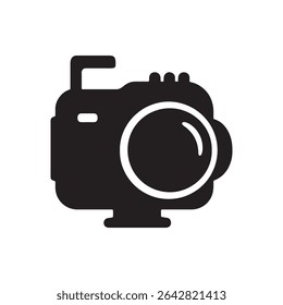 A black and white graphic icon of a camera with a large lens and flash attachment on a white background