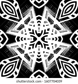 Black and white grunge geometric tribal seamless pattern. Vector ornamental abstract background. Repeat modern ethnic style greek backdrop. Symmetrical dirty ornaments with rough doodle lines, shapes.