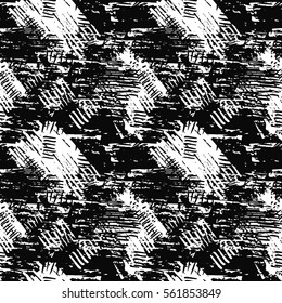 Black and white grunge seamless pattern with abstract hand drawn brush strokes and paint splashes. Messy infinity texture, modern grungy background. Vector illustration. 