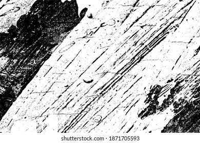 Black and white grunge texture. Black streaks of paint, ink, and dirt. Abstract monochrome background. Pattern of scratches, chips, and wear