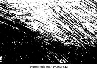 Black and white grunge texture. Black streaks of paint, ink, and dirt. Abstract monochrome background. Pattern of scratches, chips, and wear