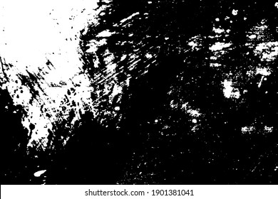 Black and white grunge texture. Black streaks of paint, ink, and dirt. Abstract monochrome background. Pattern of scratches, chips, and wear