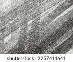 Black and white grunge vector background with texture of tire tracks on snow. UHD 4K wallpaper. For screen, desktop, site design, overlay, stencil, background, stylization, design and polygraph design