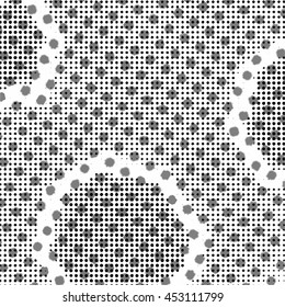 Black and white halftone grunge texture. Abstract background with circles.