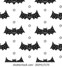 Black and white Halloween seamless pattern with doodle bats and stars.