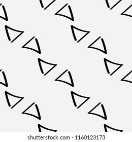 Black and white hand draw seamless background pattern of triangles