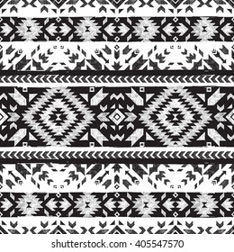 Black and white hand drawn tribal seamless pattern
