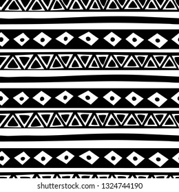 Black and white hand-drawn pattern with geometric ornament. Seamless illustration in ethnic style