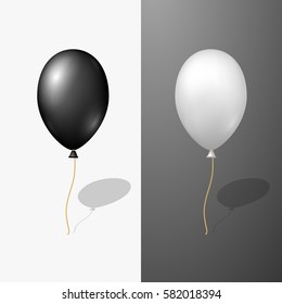 Black and white helium balloons