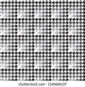 Black and white hounds tooth pattern cloth. Hounds tooth fabric background. Textile design. Gradient black color pattern on white backdrop.