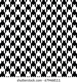 Black and white houndstooth pattern vector. Classical checkered textile design.